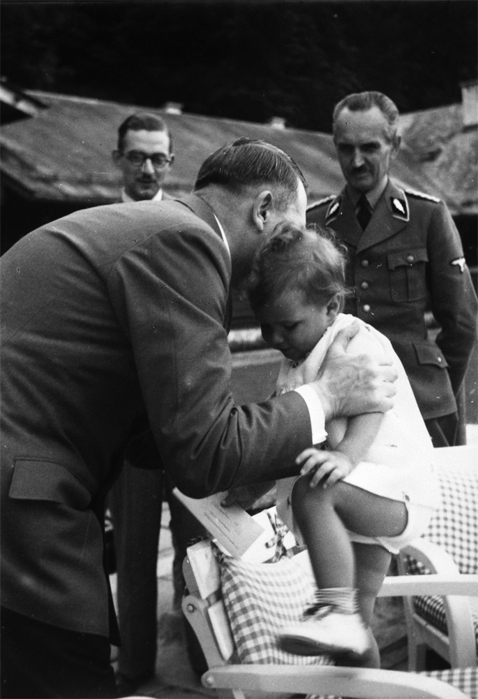 Adolf Hitler with Ursula Uschi Schneider on the Berghof terrace during the summer of 1940, from Eva Braun's albums 
